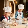 This family package by Marriott Phuket comes with gifts for kids. - Cover Image